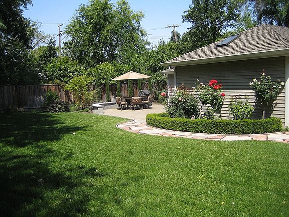 Backyard with slate path to second patio