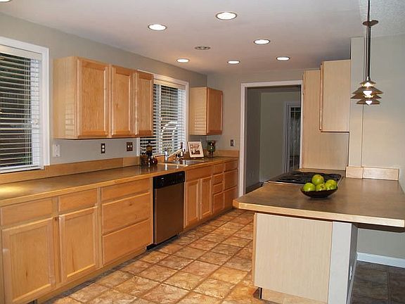 Updated kitchen with maple cabinets, Bosch dishwasher. Jenn-Air Range