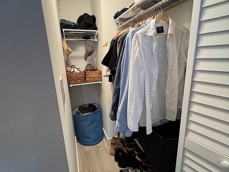 Primary Closet - Efficient closet space perfectly sized for everyday essentials, shoe rack, with shelving to maximize storage and keep your wardrobe organized.