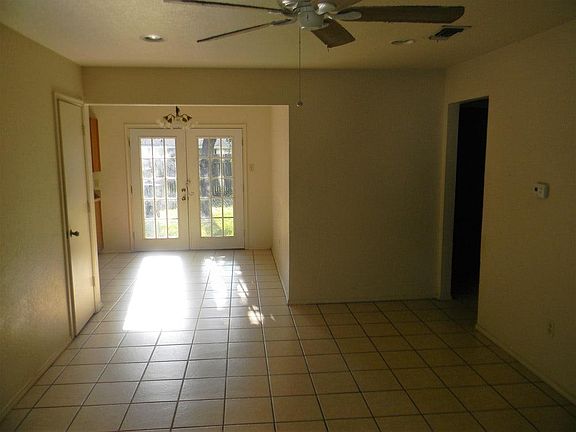 View of the Living and Dining area with back French Doors