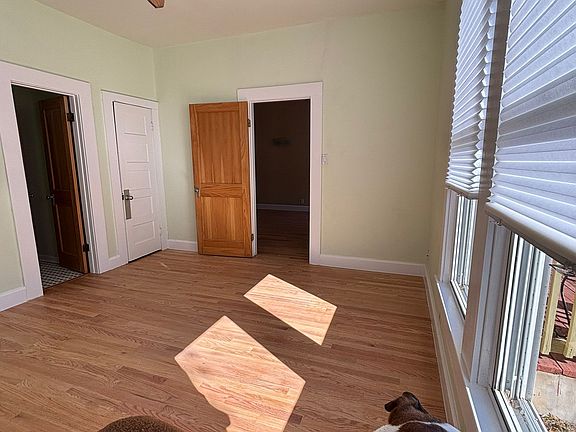 Bedroom on front of house. Lots of morning light and access to bathroom.