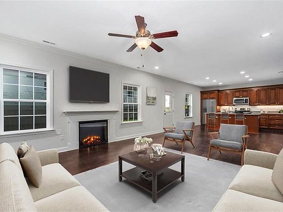 Same Model - different finishes Virtually Staged.  Refrigerator is not included.  Home is under construction