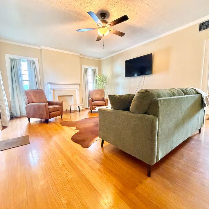 Big spacious living room with Smart TV. Fast WiFi. Insulated blackout curtains.