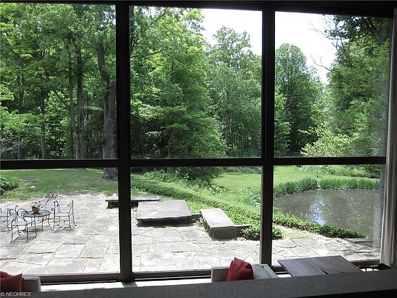 One of three stone patios that surround this home.