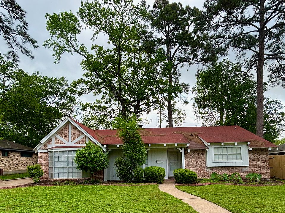 Welcome home to this lovely brick home with a large yard.