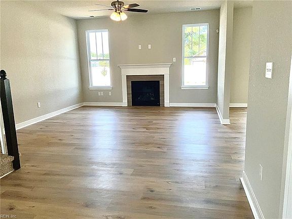 Great room includes gas log fireplace