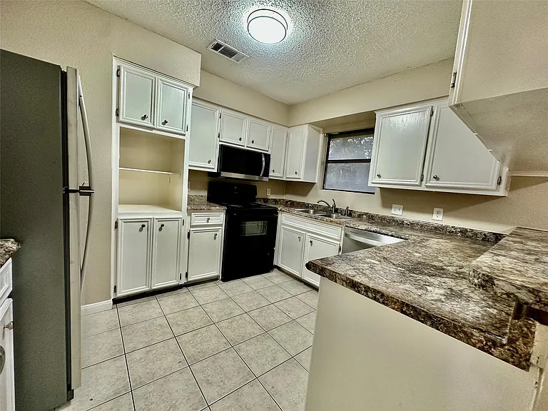 1611 Onion Creek Village Dr #A — Photo 9