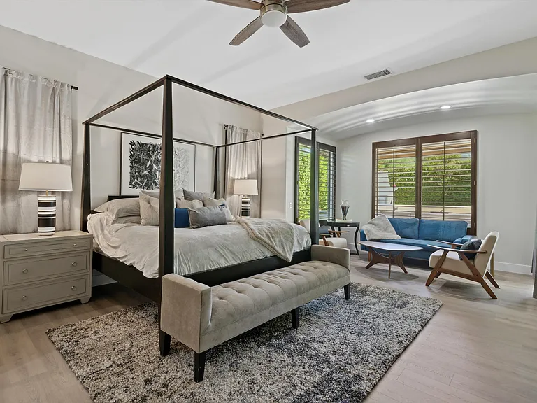 Primary Suite with king bed and seating area