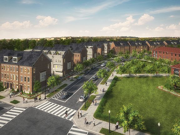Wide sidewalks frame a picturesque streetscape.