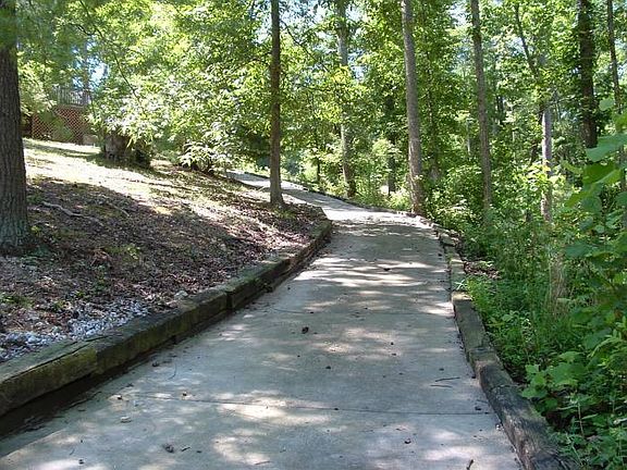 Golf cart path to lake