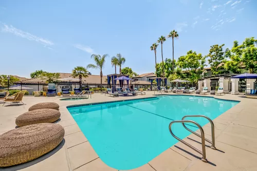 Resort Style Pool and Sun Deck at The Hills at Quail Run in Riverside, California - The Hills at Quail Run Apartment Homes