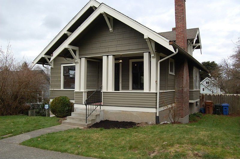 Nice Craftsman with a new paint job and an open front porch.