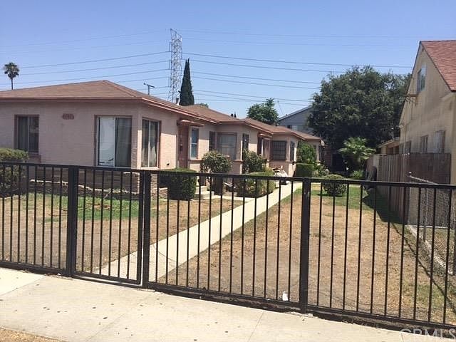 4 Units on a large lot. Possibly room to expand.