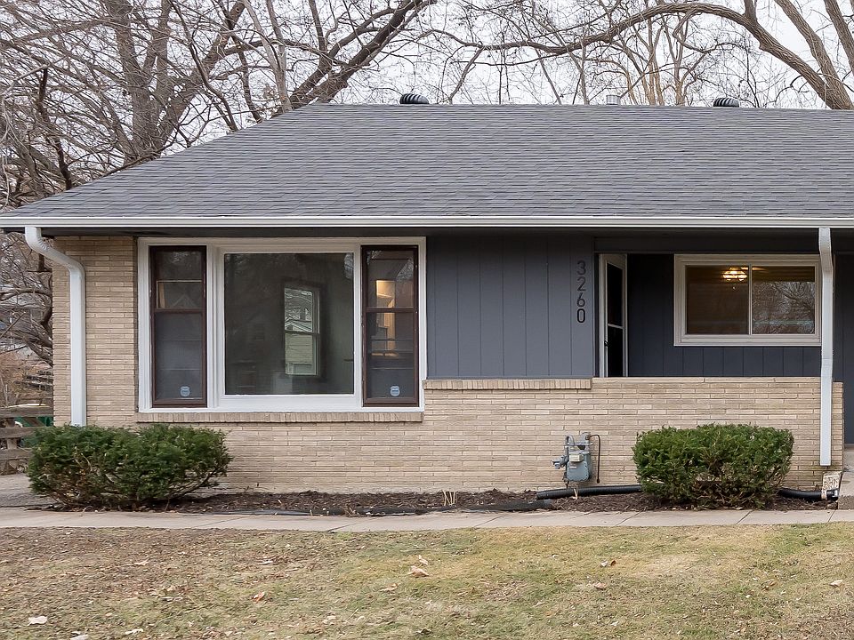 Front view of 3260 France Ave N with large picture window.