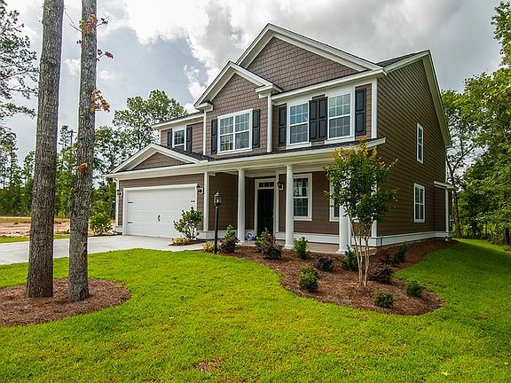 Photos are of a similar home