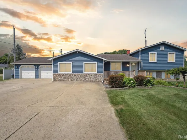 2058 S Belsay Rd, Burton, MI 48519