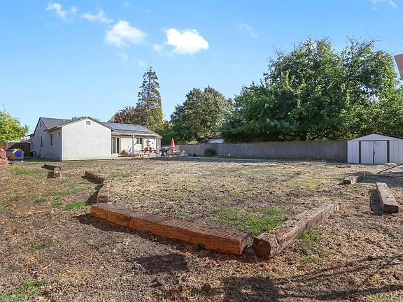 This huge 1/4 acre lot gives you space for your imagination. New sprinklers have been installed in the backyard and ready for your desires.