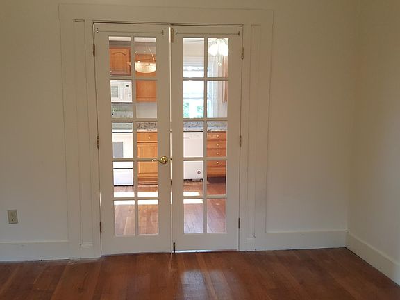 French doors from dinning room to kitchen.