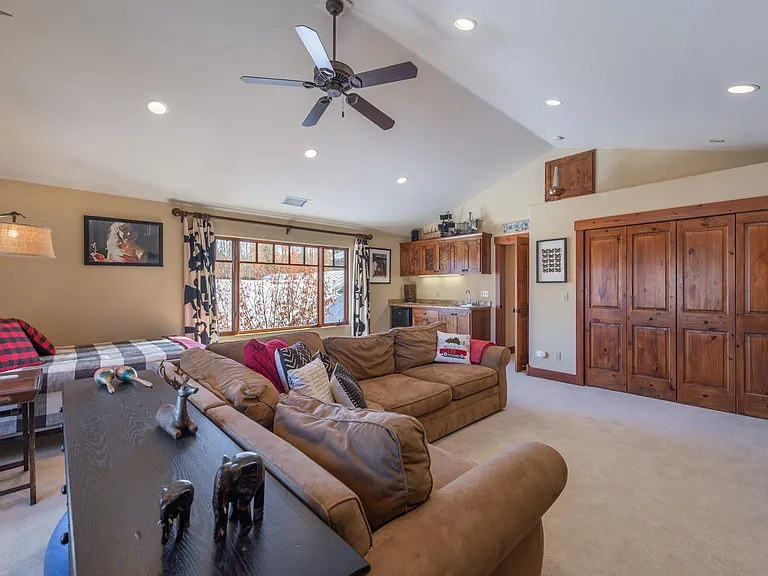 Wet bar and mini fridge keeps things chill while you're relaxing upstairs