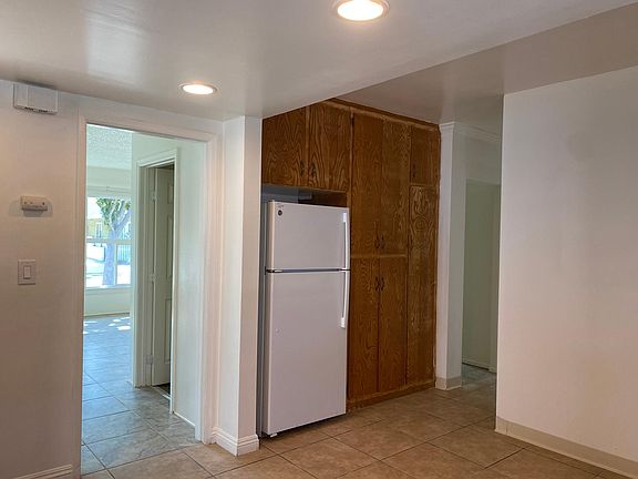 kitchen view with refrigerator