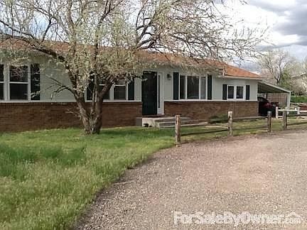 7810 E. Lake Drive, near Evansville
						:
						Has crushed asphalt circle drive and carport. Coming soon: new roof.