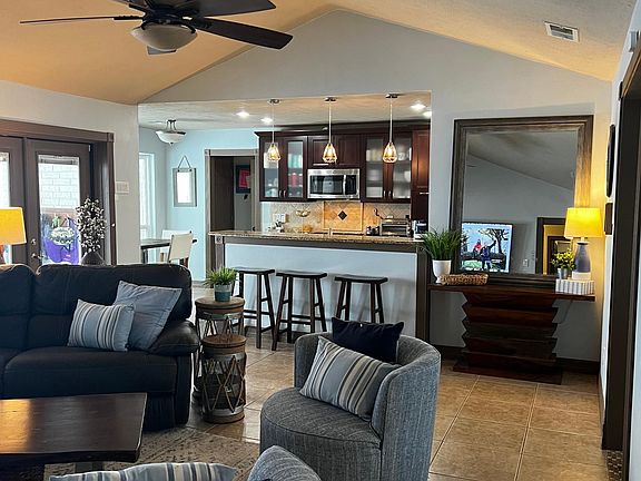 view from hallway to 2 bedrooms