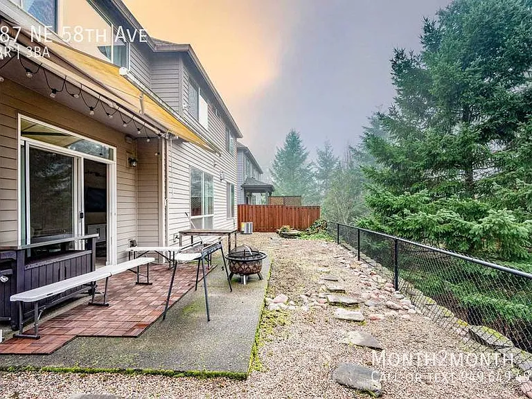 487 NE 58th Ave — Photo 25