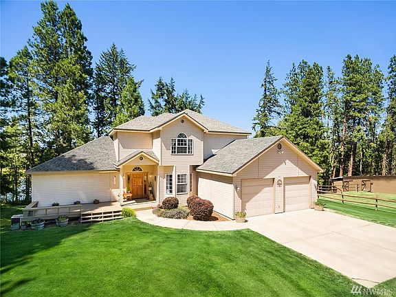 Welcome to this lovely secluded home on Hawk Haven Road.