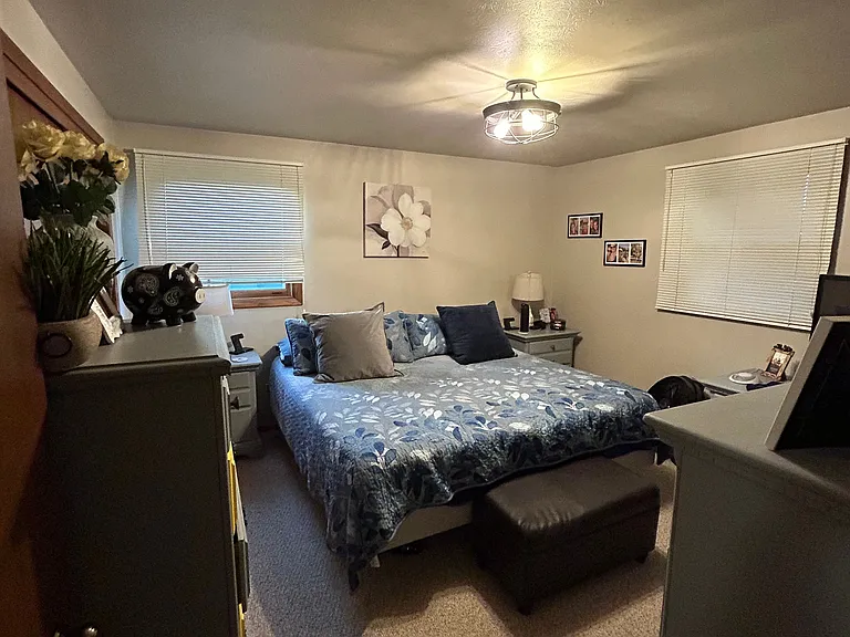 Large primary bedroom with large double wide closet