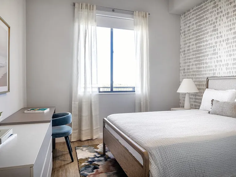 Bedroom with vinyl plank flooring