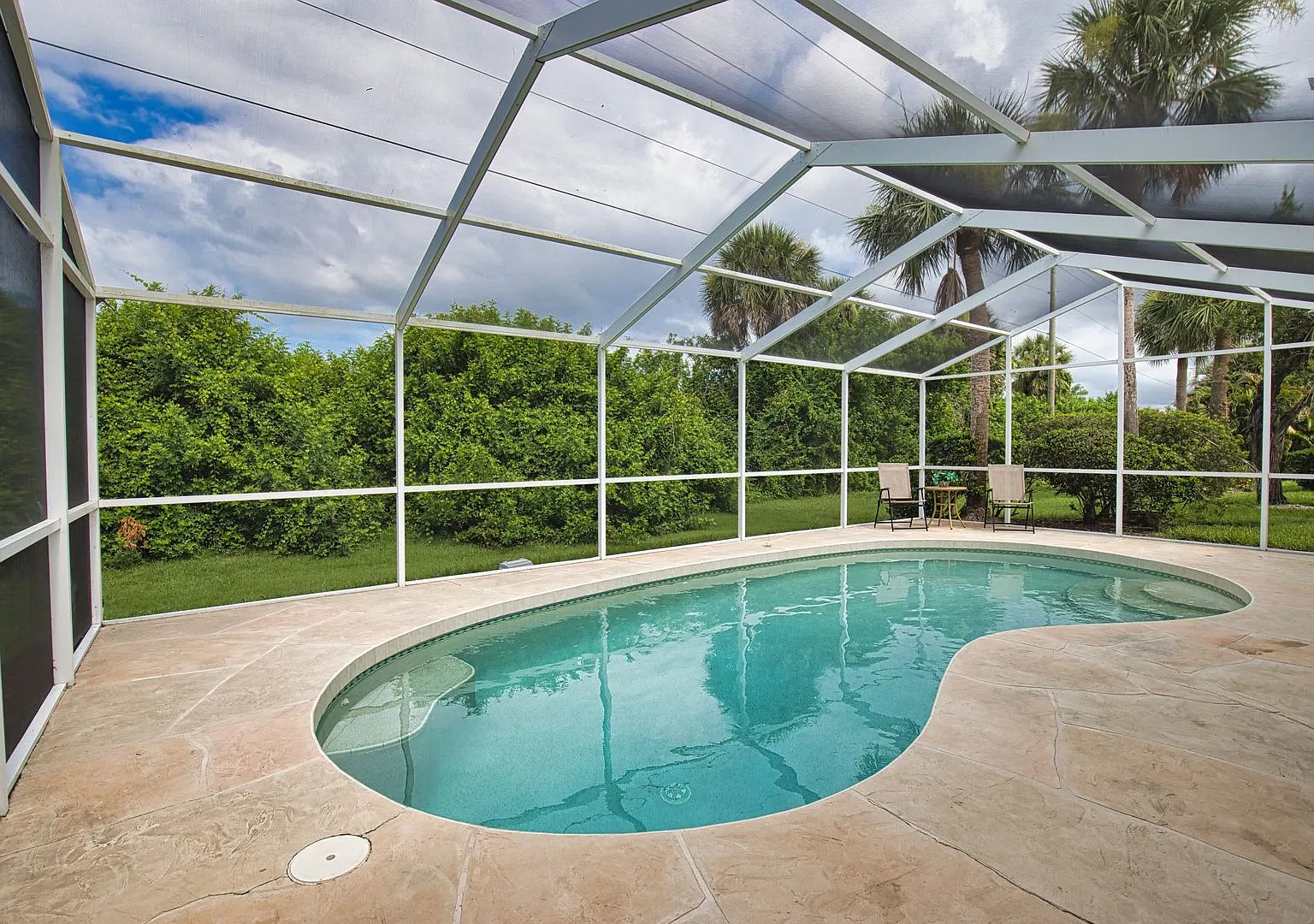 Seasonal Short-Term 2 Bed 2 Bath Heated Pool Villa with a Den in Harrington Lakes at Planation Go... — Photo 2