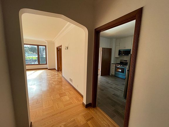 Living room (left), kitchen (right)