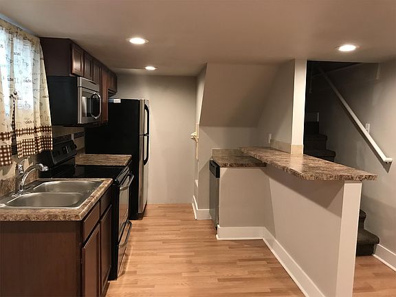 View of kitchen and stairs