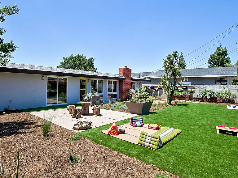 Artifical turf with low-water garden & Master suite patio