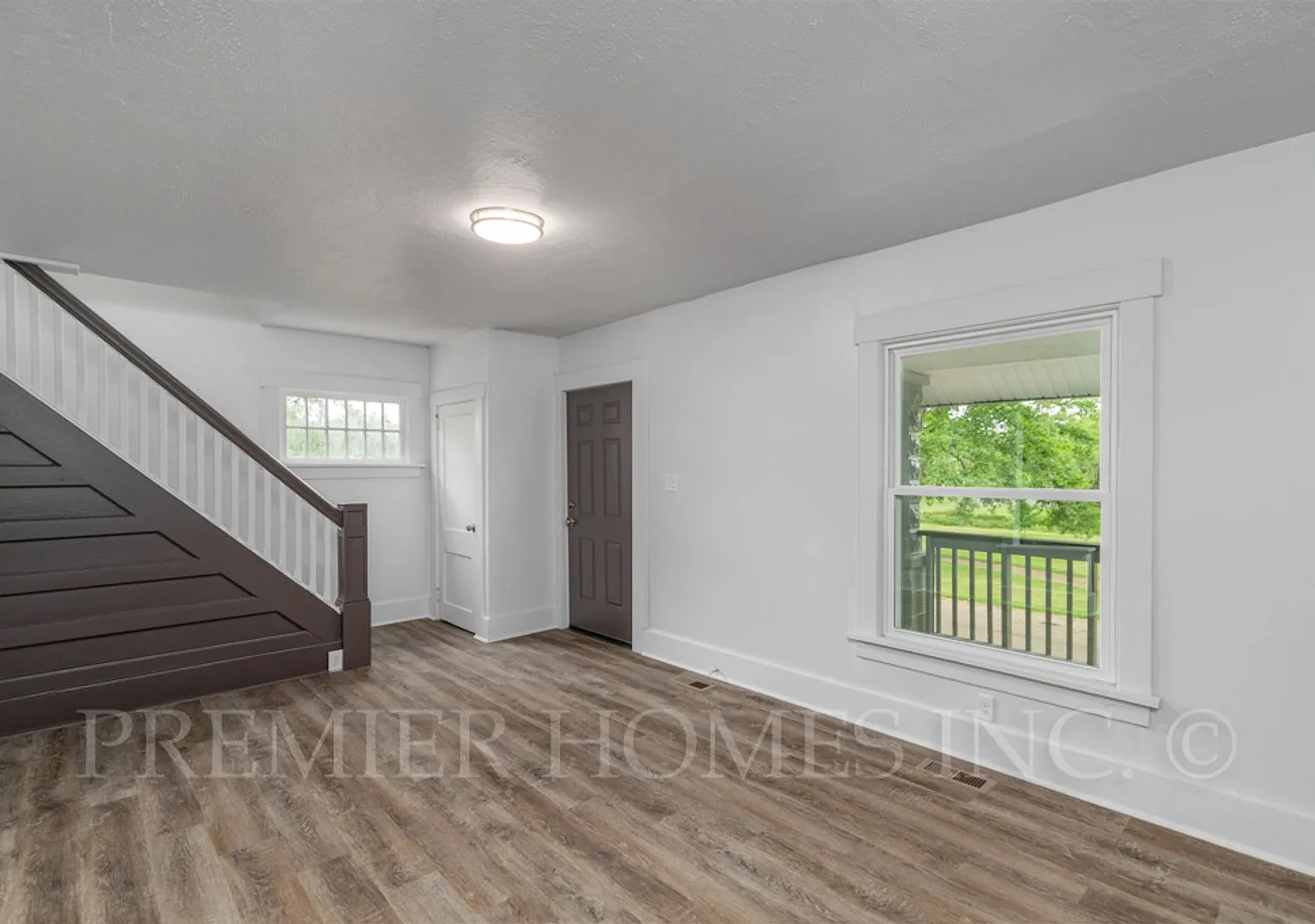 Park-Front Renovated 3BR/1BA with Huge Porch & 3-Car Garage! -415 Elgin Ave NW — Photo 4