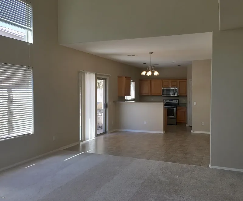 Open floor plan with dining and living rooms - 2585 E Indian Wells Pl