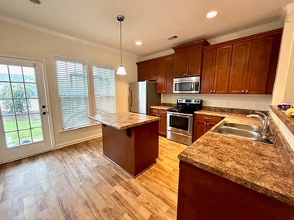 Kitchen and backdoor to small patio