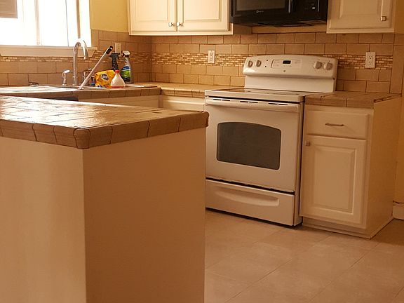 Bright, airy kitchen with updated cabinets