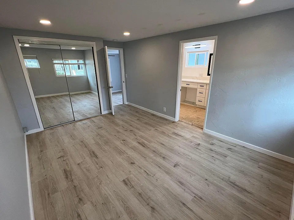 Bedroom with bathroom entry