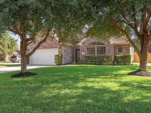 The home boasts a huge front yard as well as a huge backyard.