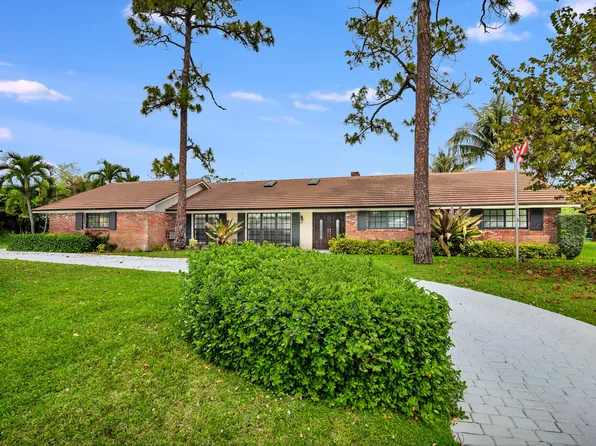 320 N Country Club Drive, Atlantis, FL 33462