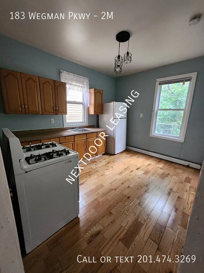 183 Wegman Pkwy — Photo 1