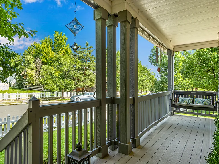 Front Porch with wind chime and art