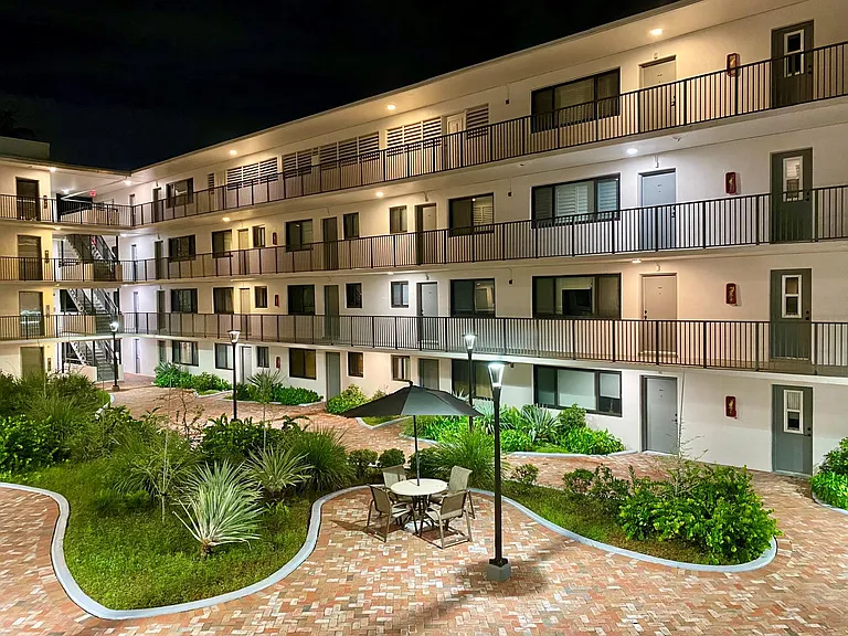 Well-lit courtyard and parking