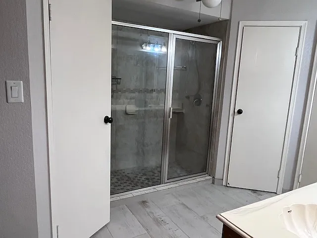 Master Bath. Walk-In Closets on Both Sides of Shower