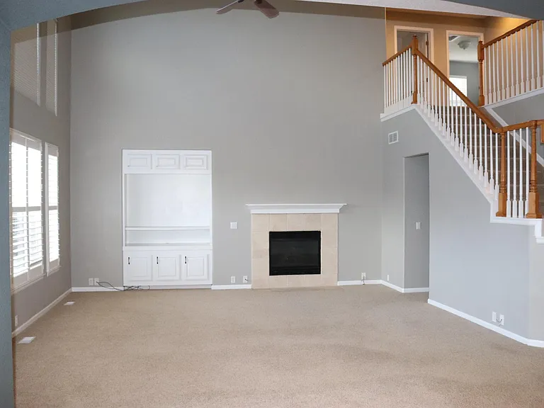 Built-in TV cabinet hold up to 65" television. Gas fireplace.