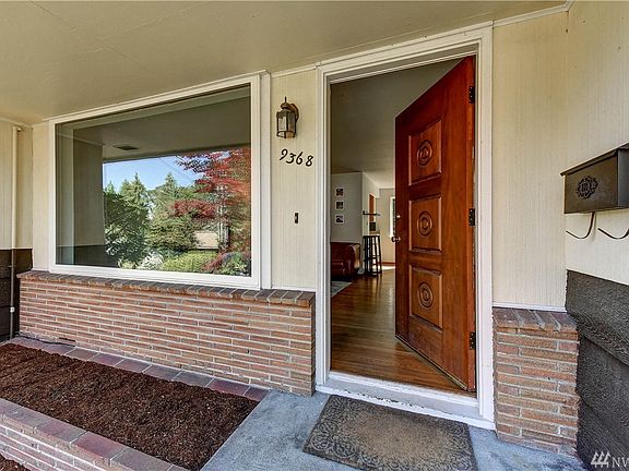 Start your own garden with the built in garden bed off to the side of the front door!