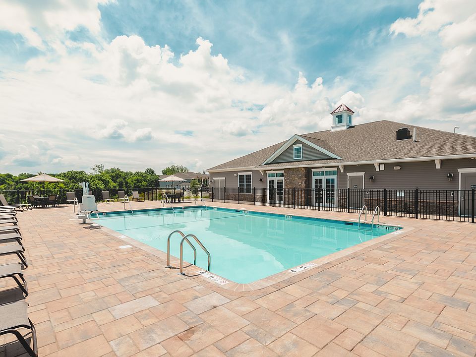 Experience relaxation by the heated outdoor pool, perfect for basking in the sun or enjoying a refreshing swim.