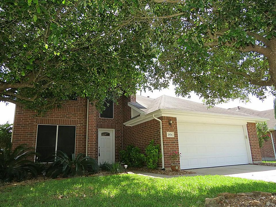 Welcome Home! Shady Front Yard with Mature Hardwood Trees