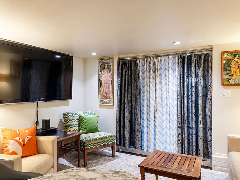 Comfy Den with 60" Smart TV with ROKU and SONOS speaker with Spotify